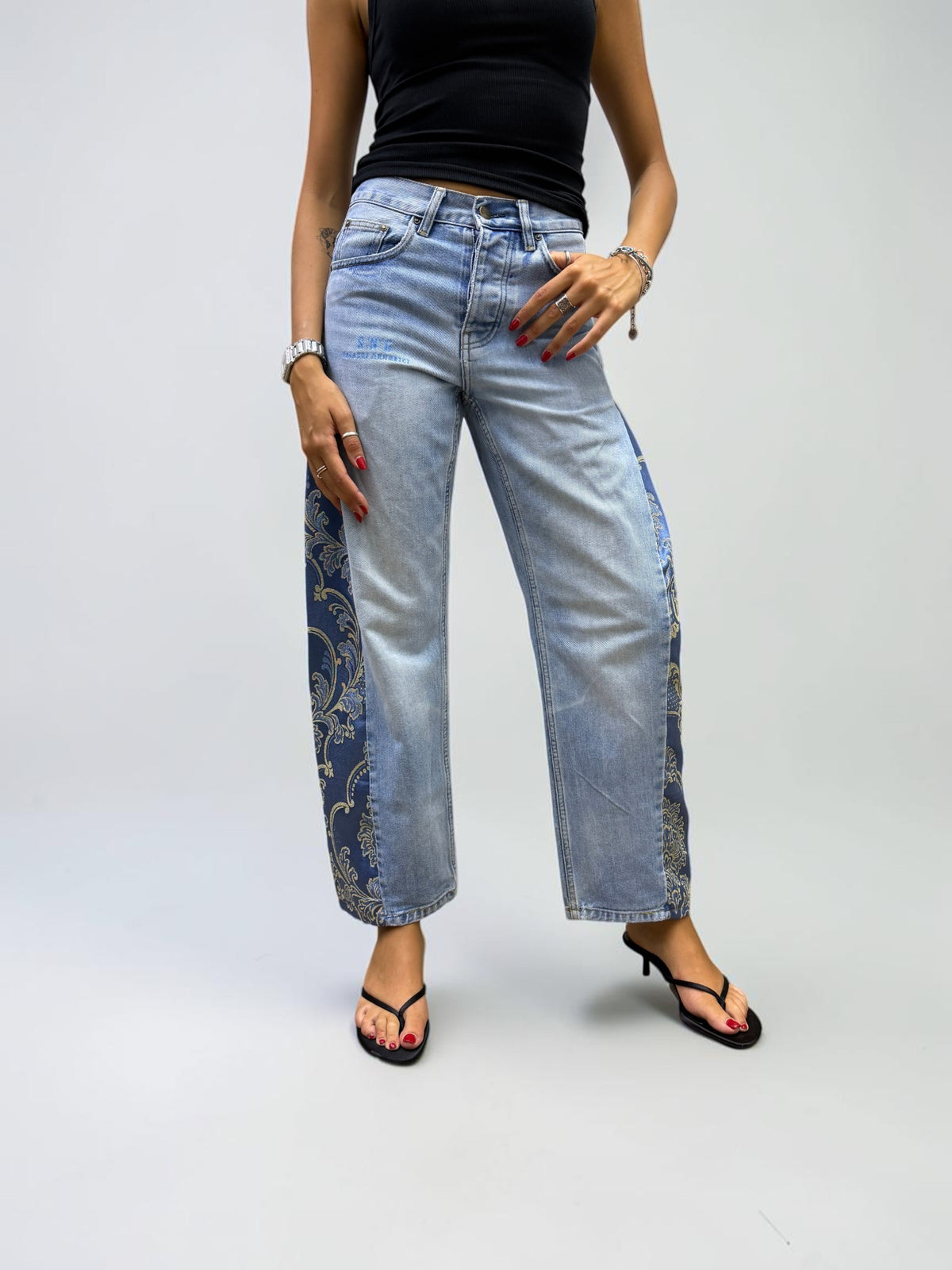 SNG Zerogrà – light wash vintage Carhartt trousers reworked with orange and gold floral silk from San Leucio, photo 1